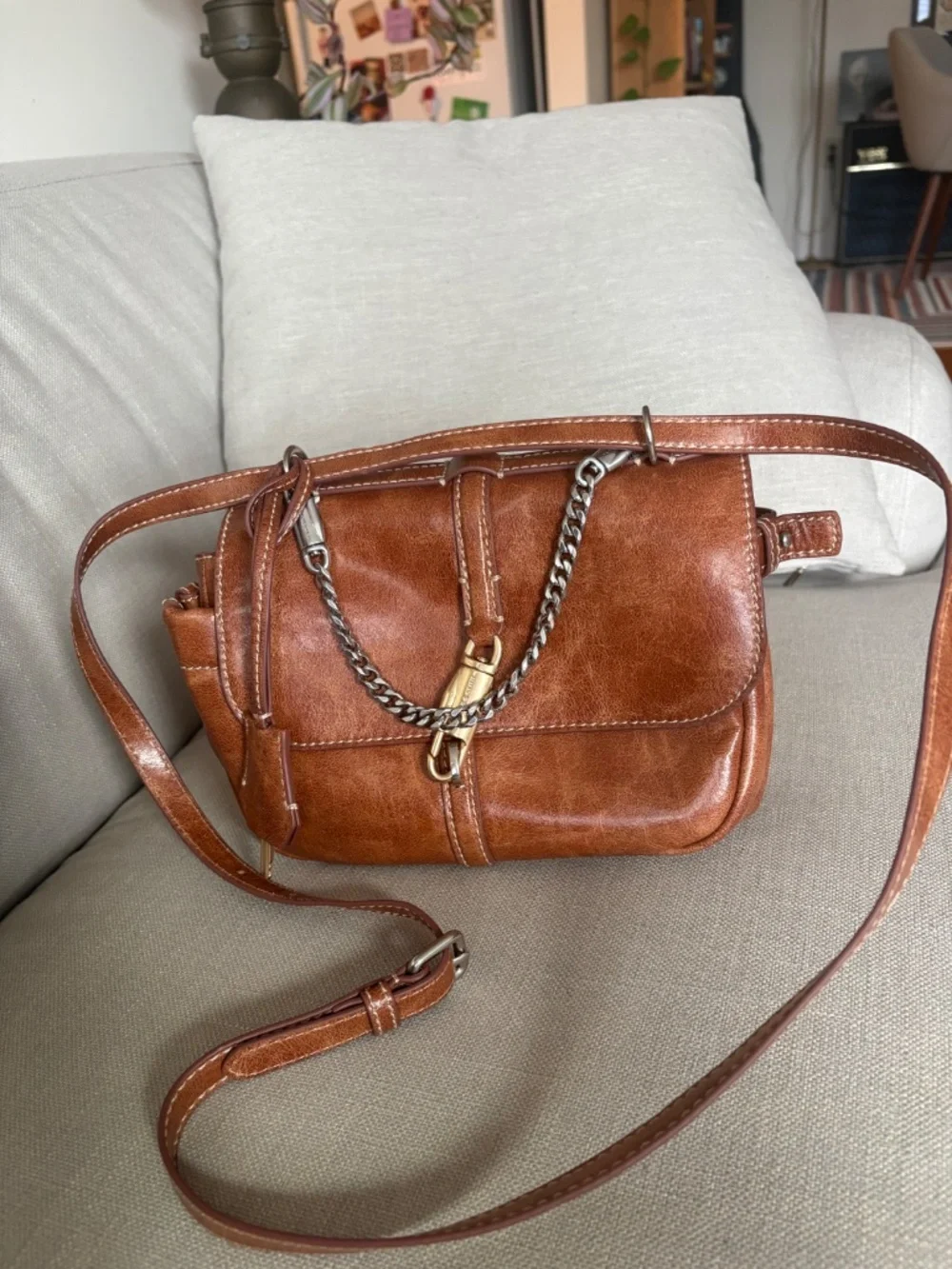 CHARLES & KEITH Delfina Chain Crossbody Bag in Distressed Tan